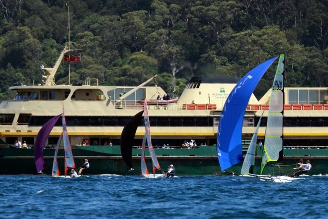 29ers and a 49er head towards a ferry on the western side of the Harbour - Sail Sydney 2009 © Harvie Allison Photography http://www.harvpix.com